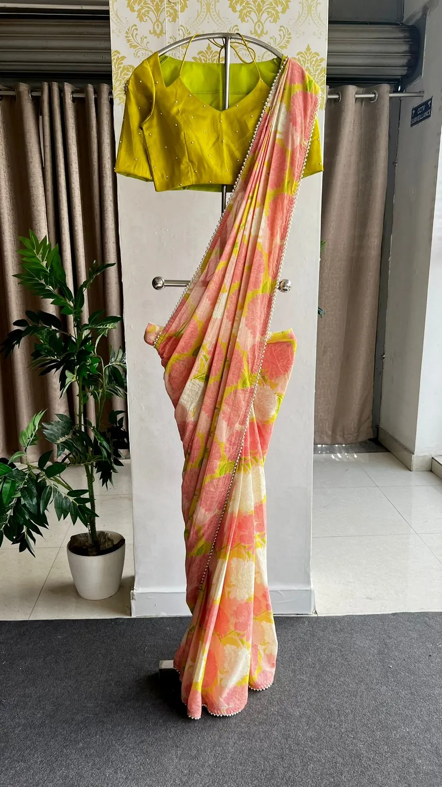 Pink floral cotton saree with lime yellow silk hand work blouse